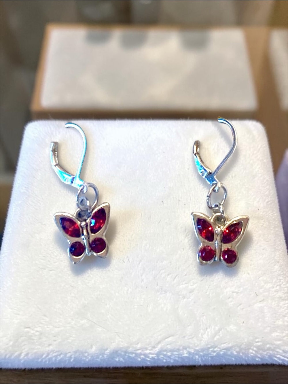 Sterling Butterfly Drop Earrings with Red Stones
